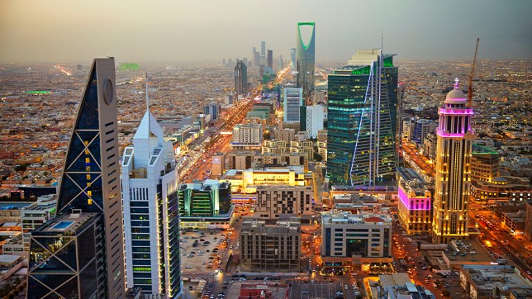 The Riyadh skyline at dusk with the Kingdom Centre tower, Saudi Arabia